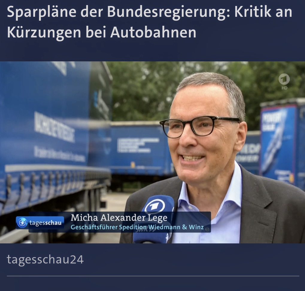 Ein Screenshot von einem tagesschau24-Beitrag bei dem gerade ein Geschäftsführer interviewt wird.